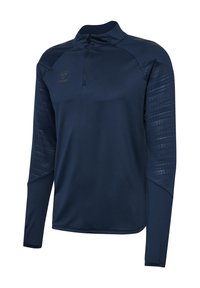 Haut de sport bleu marine à manches longues avec fermeture éclair partielle, manches texturées et logo discret sur le côté gauche de la poitrine.