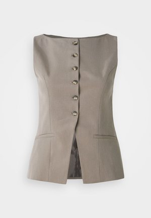 Brown tailored vest featuring a high neckline, six buttons down the front, two front pockets, and a slightly flared silhouette.