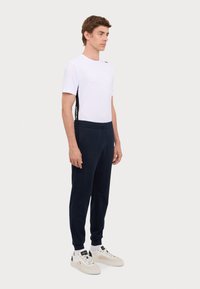 EA7 Emporio Armani TRAIN CORE PANTS - Treniņtērpa apakšdaļas - armani blue