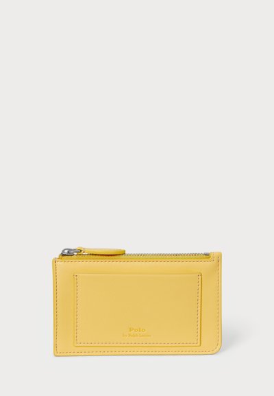 Yellow leather cardholder with a zip closure, features a front card slot, neat stitching, and embossed logo detail. Textured finish.
