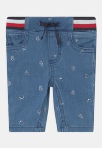 Dżinsowe szorty z elastycznym paskiem, w kolorze niebieskim, z małymi haftowanymi wzorami rąk i uśmiechów. Ściągacz w pasie z czerwonymi, białymi i niebieskimi akcentami.