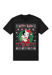 Černé tričko s vánočním motivem Betty Boop, která má na hlavě sněhovou čepici. Okolo jsou větvičky cesmíny, sněhové vločky a červená mašle.