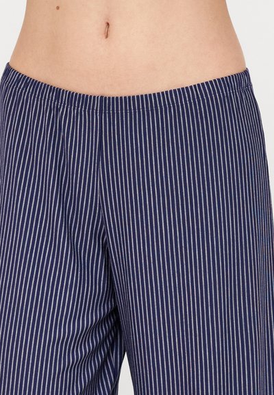 Navy blue pajama pants with white vertical stripes, elastic waistband, lightweight fabric, and a relaxed fit.