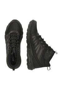 Schwarze Wanderschuhe mit einem Obermaterial aus Mesh, Gummisohle und strukturierten Akzenten. Mit Schnürverschluss und verstärktem Knöchelrahmen.