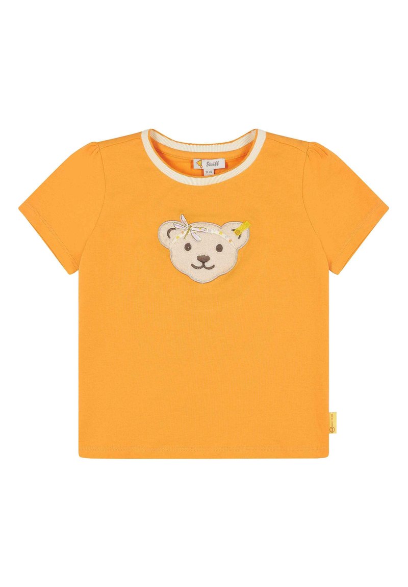 Kurzärmliges oranges T-Shirt mit Rundhals-Ausschnitt, das auf der Vorderseite ein strukturiertes Bären-Applikation mit floralen und gelben Akzenten zeigt.
