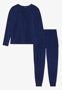 Laivaston loungewear-setti, johon kuuluu pitkähihainen, pyöreäkauluksinen paita ja kapeat, joustavavyötäröiset housut, joissa on sivutaskut. Pehmeä kangas, rento istuvuus.