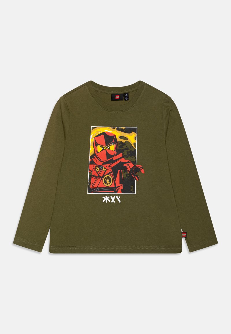 Long-sleeve olive green T-shirt featuring a red ninja graphic with yellow accents and a white print below, made of soft cotton material.