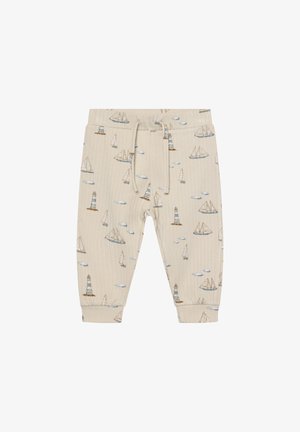 Beige ribstrikkede bukser med maritimt print med både, fyrtårne og skyer. Elastik i taljen med snøre og elastiske manchetter.