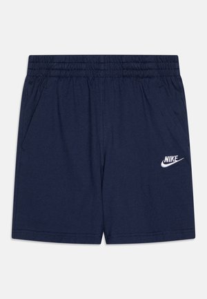 Navyblå Nike-shorts med elastisk taljebånd, sidelommer og hvidt Nike-logo på nederste højre ben.