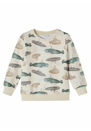 Sudadera color crema con diversos patrones de submarinos en verde, gris y naranja. Puños y cuello acanalados que añaden textura.