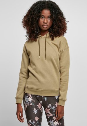 Hooded sweatshirt in olive green, made of soft fabric, featuring a drawstring and ribbed cuffs. Paired with floral patterned leggings.