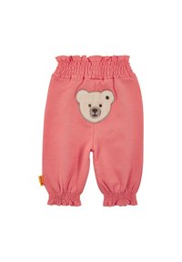 Pantaloni di cotone rosa con vita elastica e polsini a volant, con applicazione di un volto d'orso sul davanti. Materiale morbido e leggero.