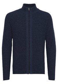 Sudadera con cremallera color azul marino, con un cuello alto, fabricada en un tejido de punto texturizado y de mangas largas, que cuenta con una cremallera frontal y detalles acanalados.