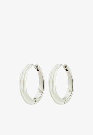 Silver hoop earrings with a smooth, textured surface and a slightly wavy shape, featuring a secure clasp for closure.