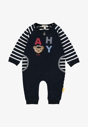 Tmavě modrý fleecový overal s pruhovanými rukávy, zdobený nášivkou medvěda a písmeny "A," "H," a "Y." Zapínání na zip a kulaté kapsy.