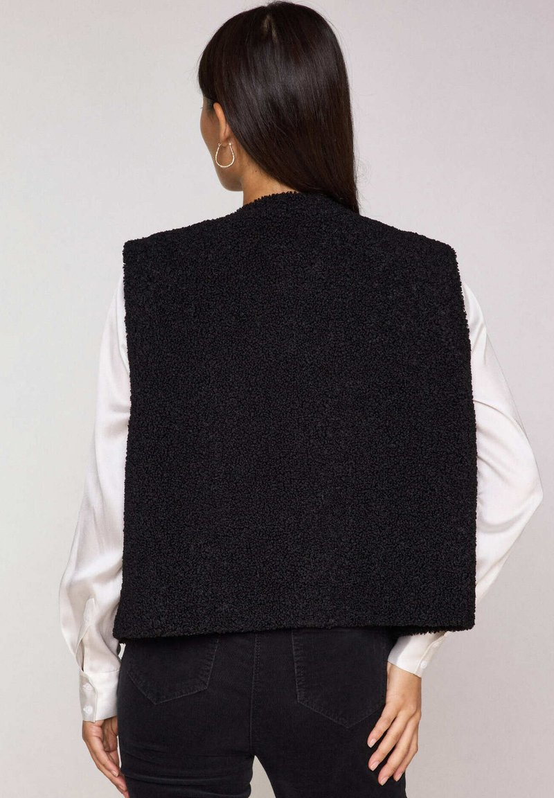 Maison 123 Veste sans manches noir ZALANDO