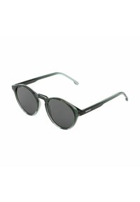 Occhiali da sole rotondi con lenti scure, montatura verde traslucida e aste trasparenti. Presentano un design minimalista con il marchio sulla tempia.