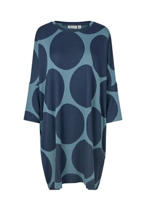 Marineblå og teal oversized top med trekvartærmer, med store cirkulære mønstre og en rund halsudskæring. Blød stofstruktur.