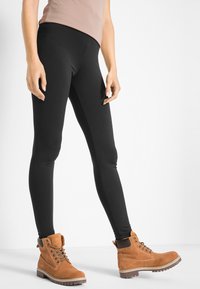 bonprix Leggings - schwarz