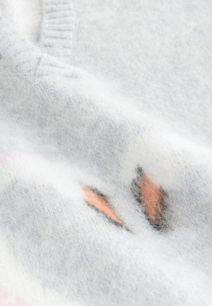 Light gray sweater made of soft material, featuring a fuzzy texture and a subtle pattern with orange and pink accents.