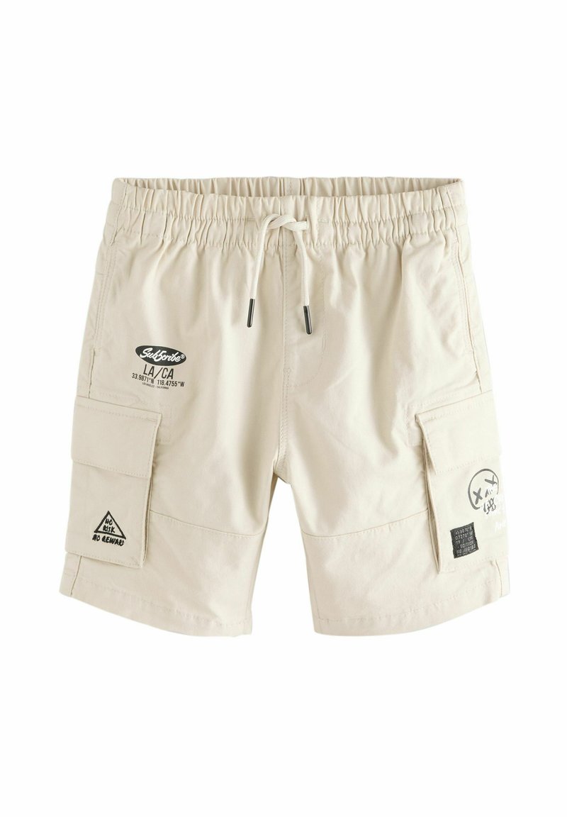 Beige cargo shorts with an elastic waistband, drawstring, side pockets, and printed logos. Features a smooth texture and mid-thigh length.