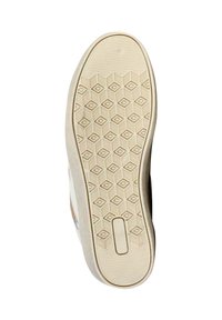 Semelle en caoutchouc de couleur beige. Présente un motif hexagonal pour l'adhérence. Bords lisses et un sillon central pour la flexibilité.