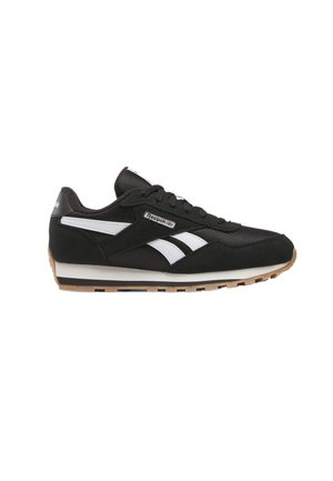 Sneaker Reebok bianco e nero con suola in gomma, design con lacci e marchio bianco sui lati e sul retro, mostrata dal lato esterno.