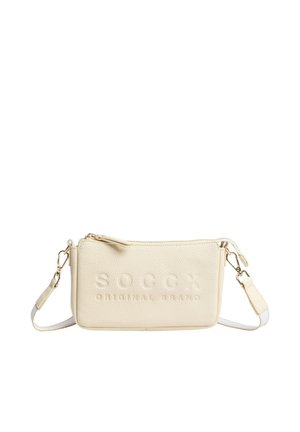 Small beige textured crossbody bag with a detachable strap, gold-tone clasps, embossed "SOCCX ORIGINAL BRAND" logo, and a zippered top closure.