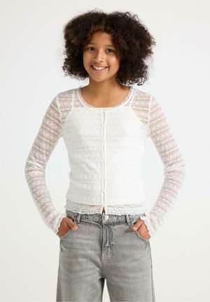 Top bianco a maniche lunghe con texture in pizzo e chiusura a bottoni, caratterizzato da un design a coste e bordi ondulati ai polsini e all'orlo.