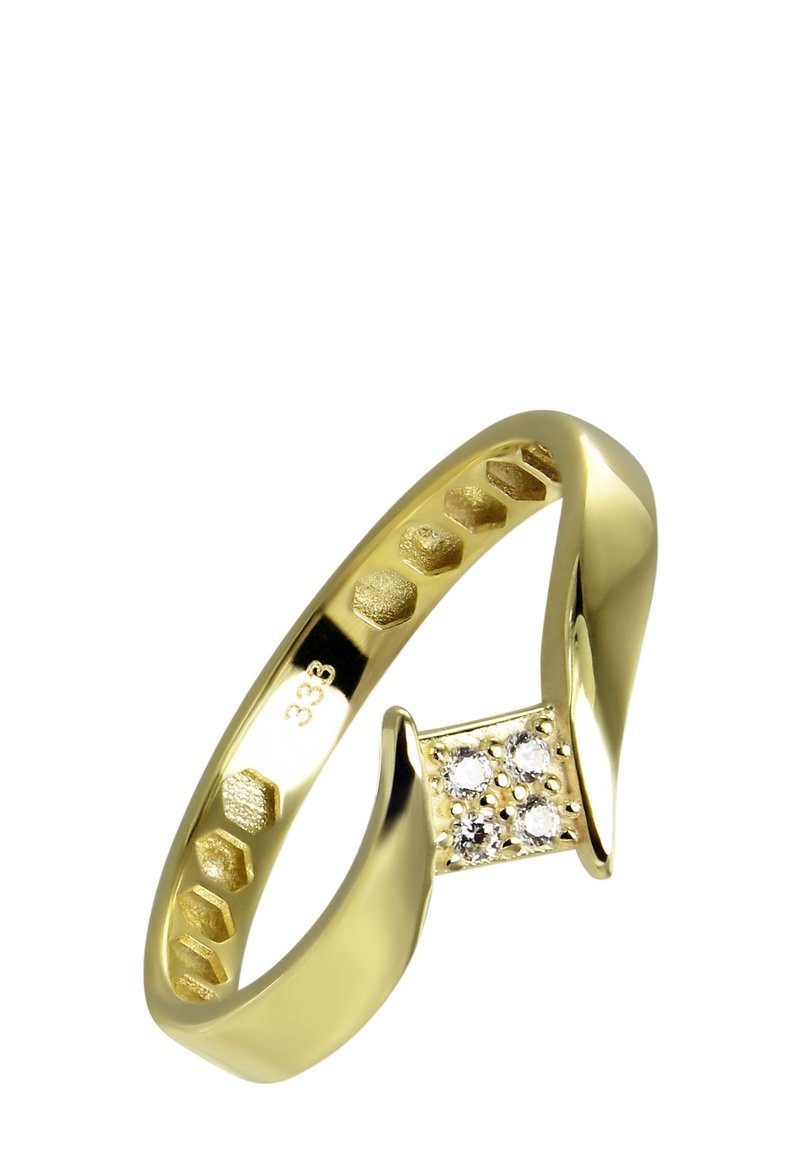 Bague en or avec un anneau lisse et incurvé, présentant un groupe central de quatre petites pierres précieuses claires. L'intérieur possède des détails hexagonaux.