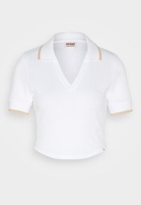 Polo shirt blanco de manga corta y con cuello en V, con acentos beige en el collar y los bordes de las mangas. Tejido texturizado.