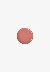 Smooth, round spot of glossy muted rose-pink nail polish on white background.
