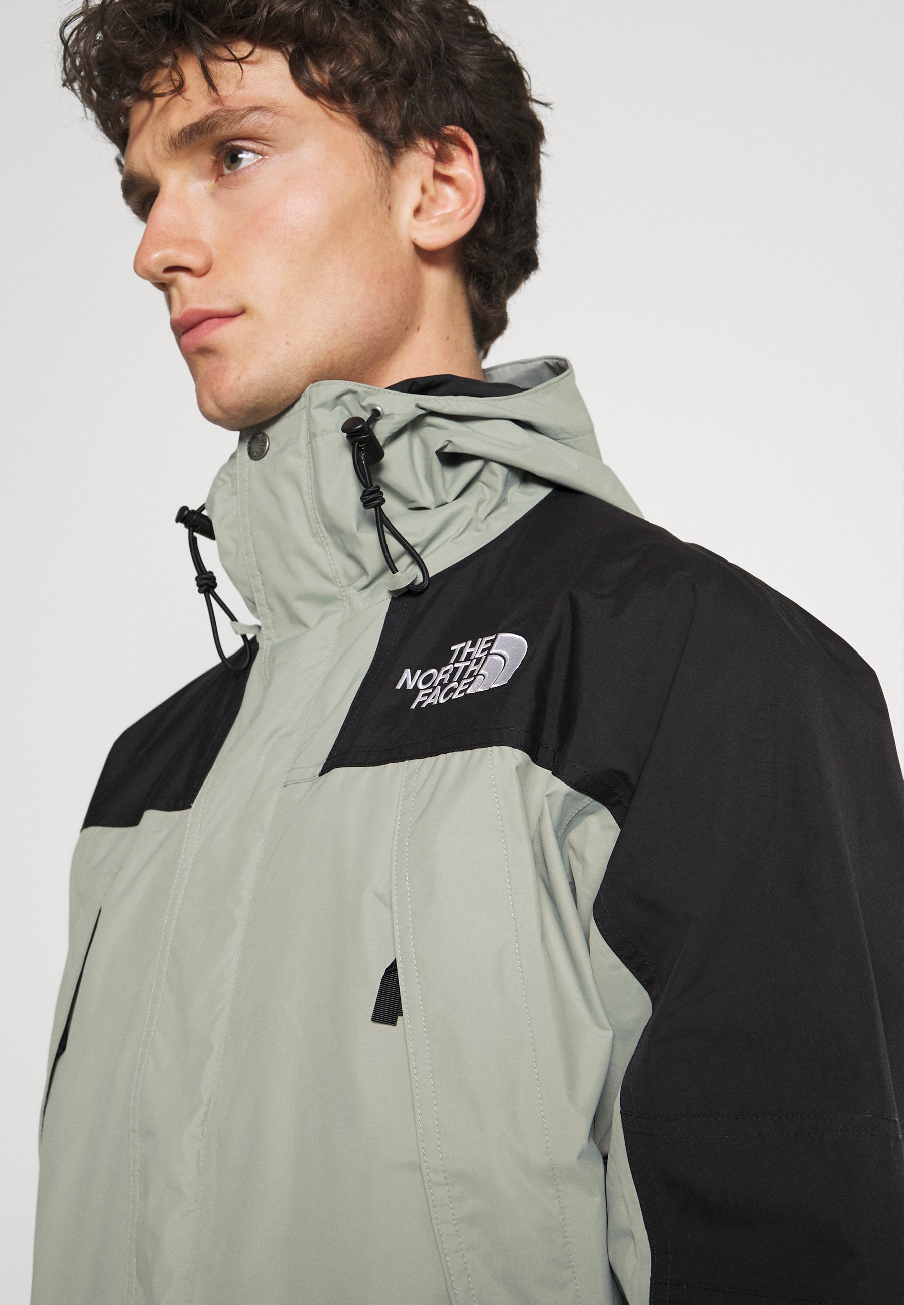 north face grey and white jacket