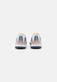 Sport shoes with a gradient design in pink, blue, and white. Textured upper, contrasting blue sole, featuring detailed patterns on the sides.