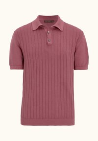 Polo a maniche corte in rosa polveroso, caratterizzato da un motivo a coste testurizzato, colletto a maglia piatta e patta con tre bottoni.