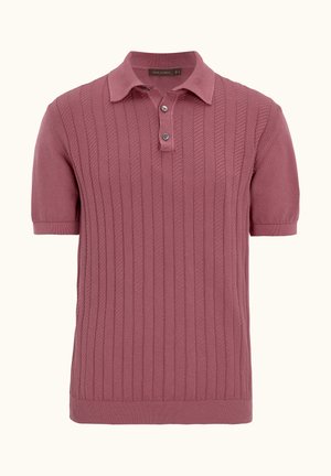 Korte mouw polo in stofroze, met een textuur met ribpatroon, een drieknopenlijst en een platte gebreide kraag.