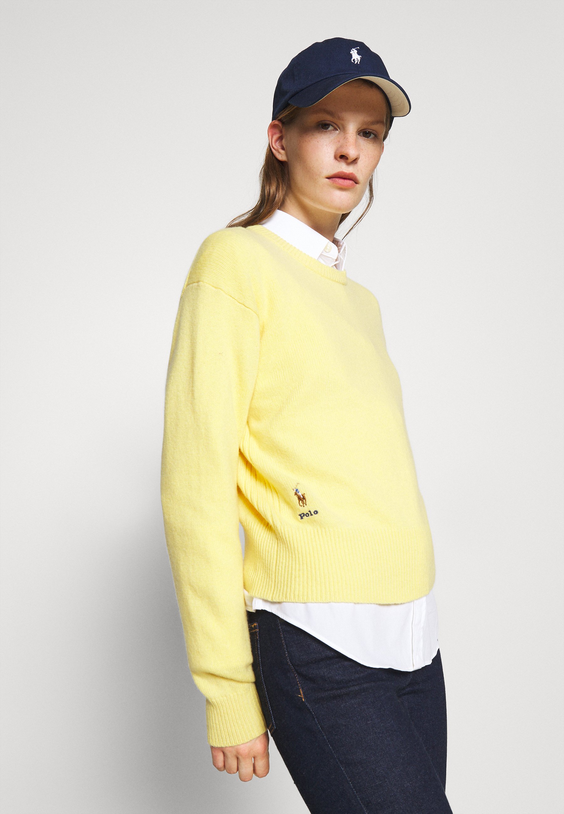 long yellow sweater