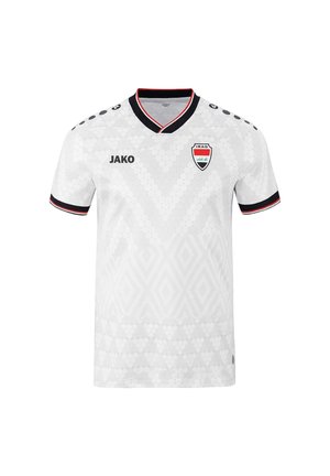 Weißes Fußballtrikot mit dezentem geometrischem Muster, schwarzem und rotem Besatz an Kragen und Ärmeln, Nationalmannschaftswappen des Iraks und JAKO-Logo.