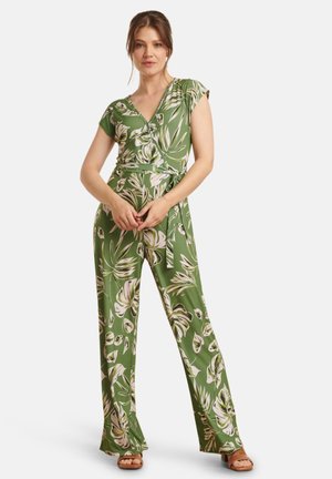 Groene jumpsuit met een bloemmotief in wit en crème. Heeft een wikkelontwerp, korte mouwen en wijdvallende broekspijpen. Glad stoftextuur.