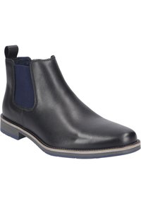 Schwarze Leder Chelsea-Stiefel mit elastischen Seiteneinsätzen, einer Schlaufe zum Anziehen und einem kontrastierenden marineblauen Innenfutter. Schlanke Silhouette mit einem gestapelten Absatz.