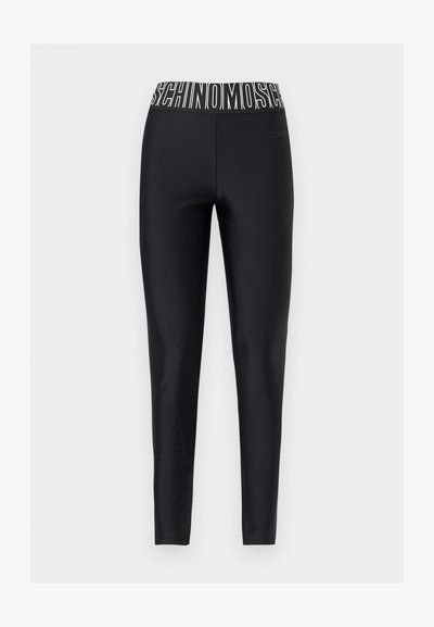 Μαύροι κολάν ολόκληρου μήκους με ελαστική μέση που φέρει έντονο λευκό λογότυπο MOSCHINO.