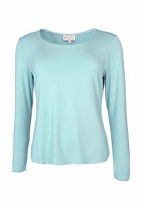 Helles blaues Langarmoberteil aus weichem Material, mit runder Ausschnittkante und gewelltem Saumdesign sowie einer lockeren Passform.