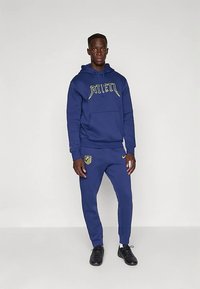 Nike Performance ATLETICO MADRID CLUB JOGGER - Športne kratke hlače - binary blue/vibrant yellow