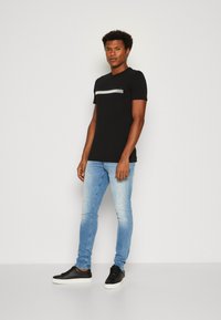 Antony Morato SUPER SLIM FIT WITH RUBBER INJECTION LOGO PRINT - Camiseta estampada - black