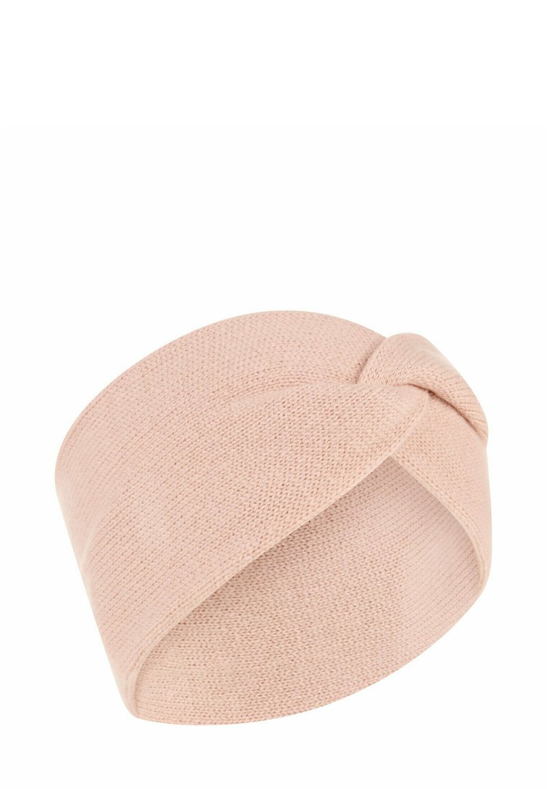 Gebreide turban haarband in zacht roze. Kenmerken een gedraaide voorkant, een gladde textuur en een elastische band voor een perfecte pasvorm.