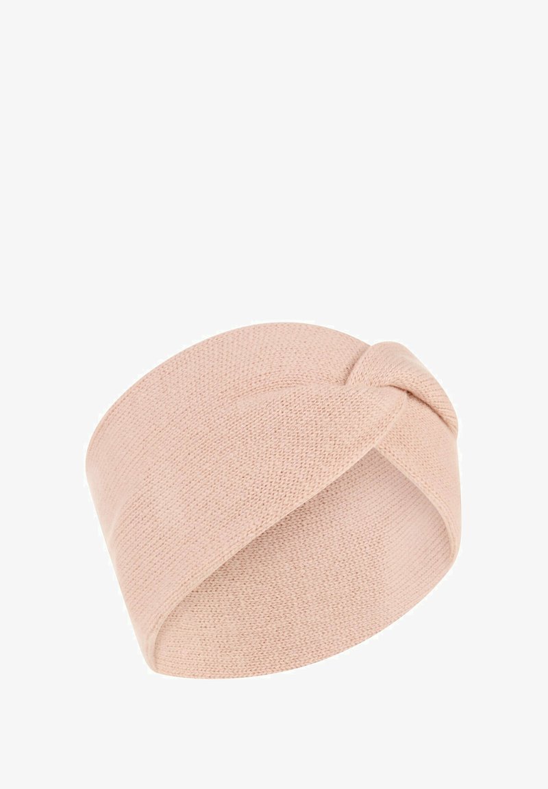 Bandeau turban tricoté en rose doux. Présente un design avant torsadé, une texture lisse et une bande élastique pour un ajustement parfait.
