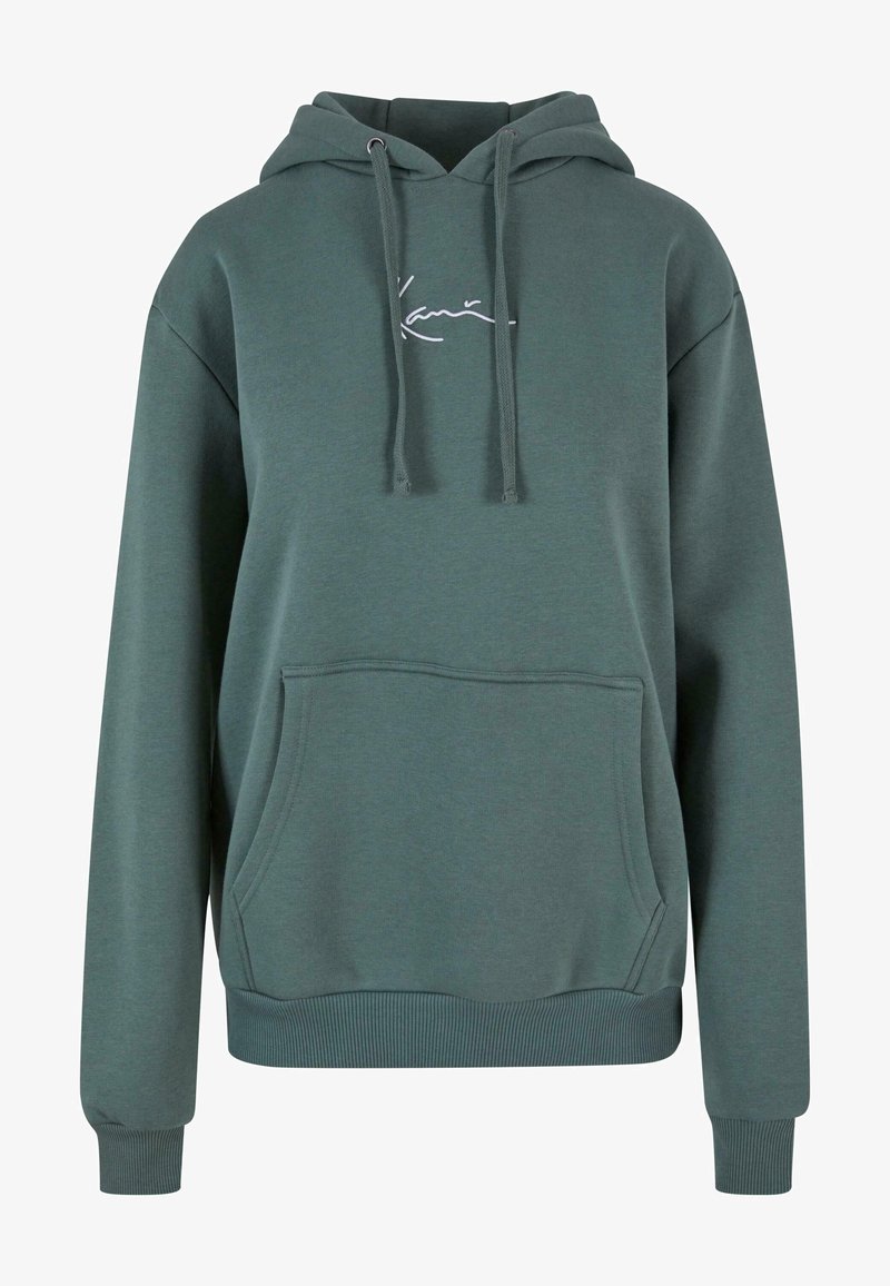 Sweatshirt à capuche en vert doux, fabriqué en tissu doux. Il dispose d'une poche avant et de poignets et d'un ourlet côtelés. Léger et avec un logo brodé.