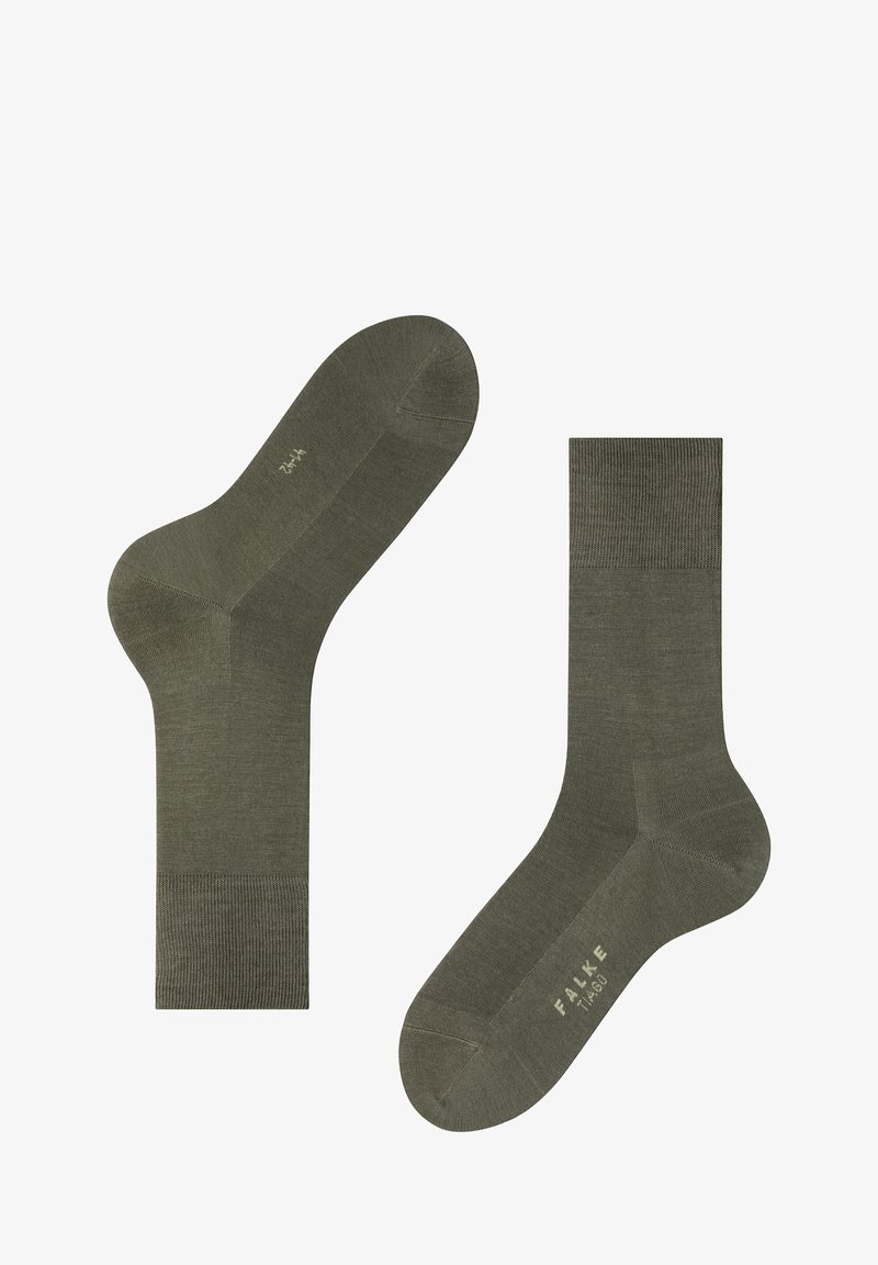 Socks in cotone verde con bordo a coste, texture liscia e tallone rinforzato, con il logo 'FALKE' stampato sul plantare.