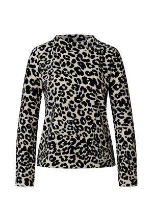 Top met lange mouwen en ronde hals, bedrukt met een zwart-wit luipaardpatroon op een lichte achtergrond.