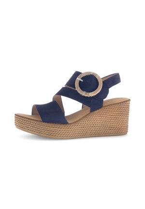 Navy wedge sandals with cross-strap design, featuring a round accent and woven-texture sole,  sturdy rubber heel, and open toe.